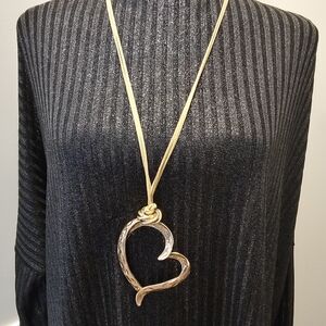 Elegant Gold and Silver Heart Pendant Necklace